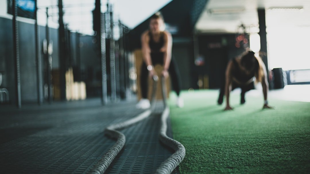 A diverse group of people engaging in various fitness activities, including yoga, running, and healthy meal preparation, representing a balanced approach to fitness.