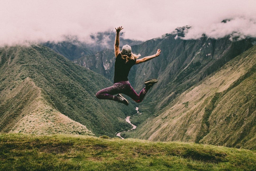 A person engaging in a light outdoor exercise, wearing comfortable clothing and supportive footwear, surrounded by nature.