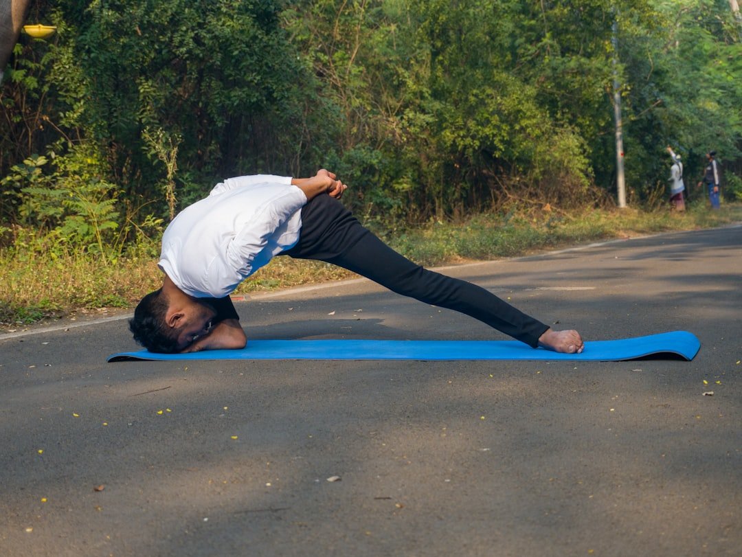 A person engaging in a morning workout outdoors, showcasing an active lifestyle with nature in the background.