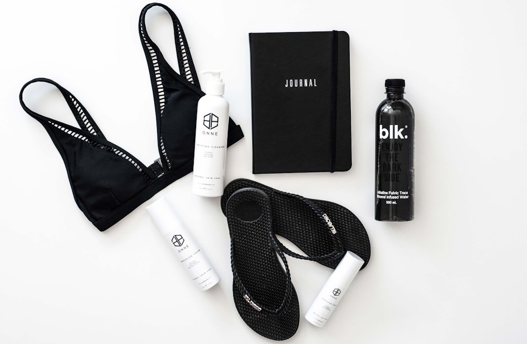 A collection of wellness items including healthy food, fitness equipment, and relaxation tools arranged aesthetically.